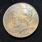 1934 P Silver Peace Dollar- HAS LOTS OF COLORFUL TONING.
