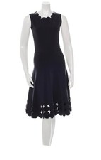 Black Oscar De La Renta Neoprene Dress With Circular Details At Neck.