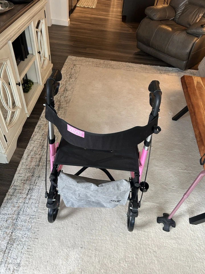 Andador vertical Vive Mobility con asiento plegable. Rosa Perla Foto 3 de 4