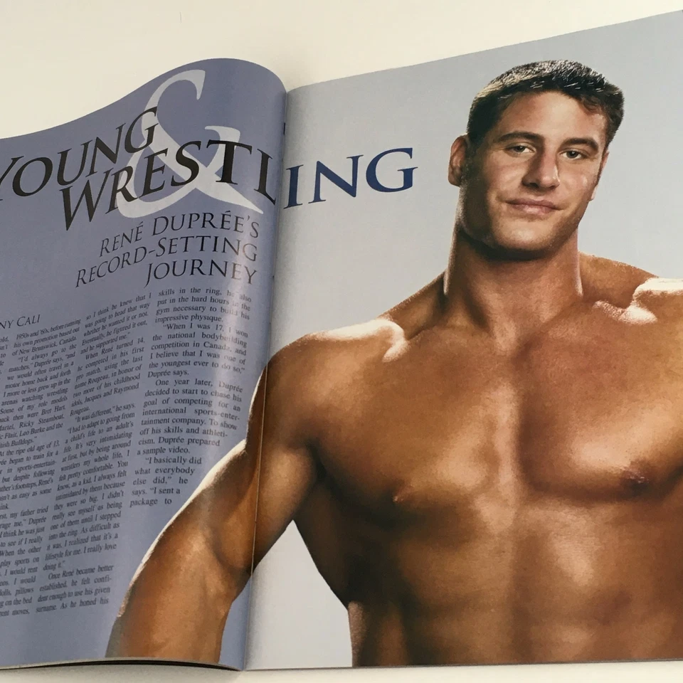 Revista WWE Raw marzo 2004 Sheriff Austin y Mick Foley, con póster sin etiqueta Foto 4 de 4