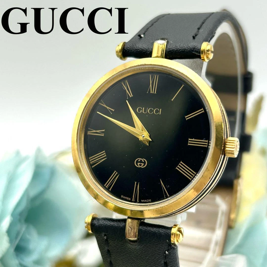 Montre femme Gucci Sherry Line ceinture cuir or