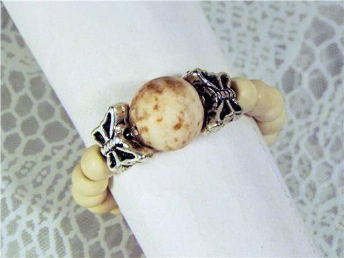 CYNTHIA LYNN "FLYING COLORS" WHITE HOWLITE SILVER BUTTERFLY STRETCH RING - Picture 1 of 6