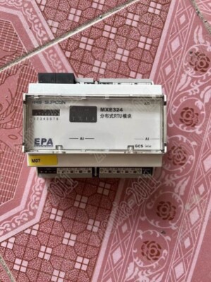 1PC  used  MXE324 RTU module #E2
