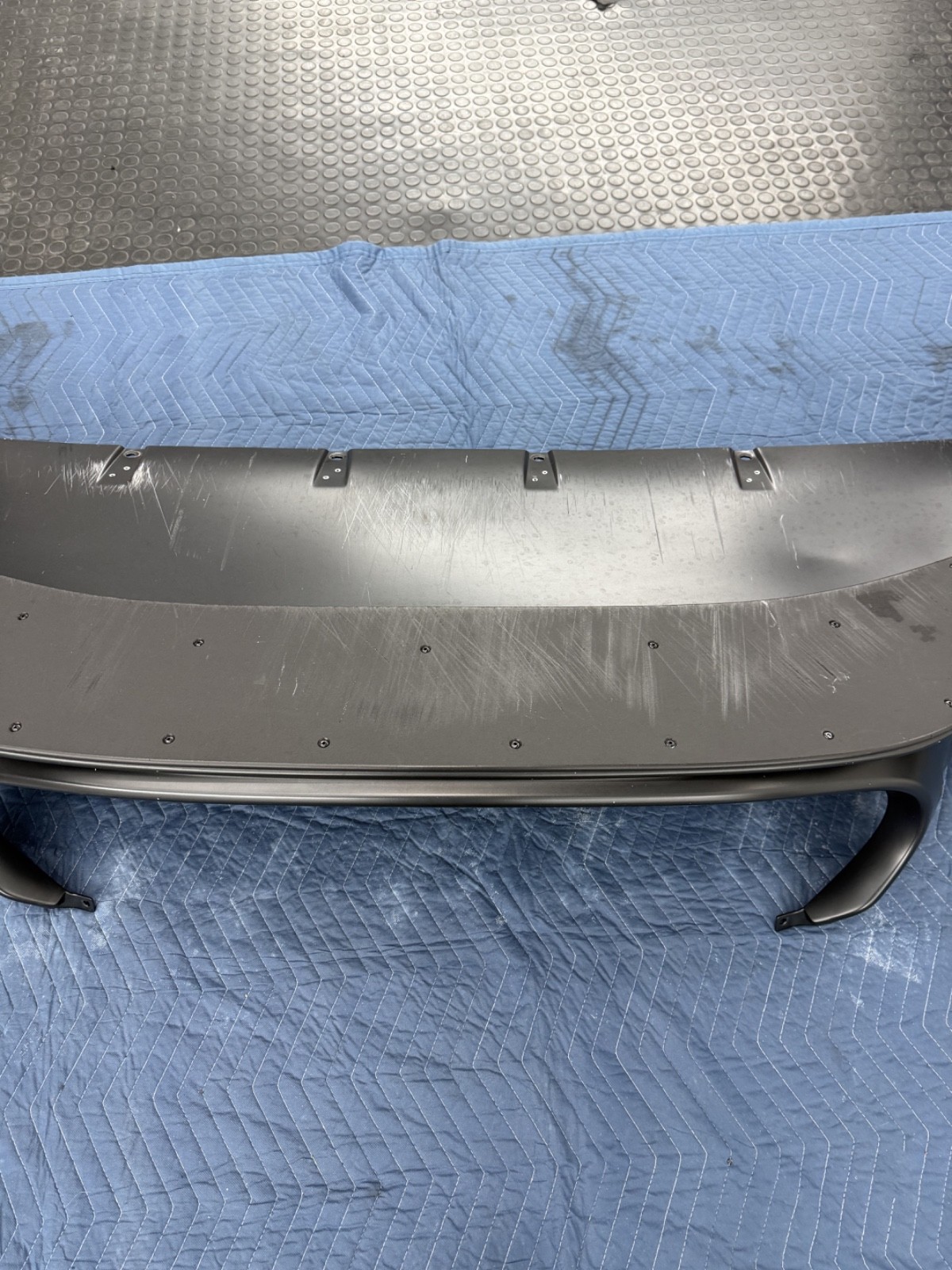Maserati MC20/Ciello. OEM Front bumper lower splitter Part no. 6702229350