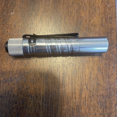 Olight Polished Stainless i3t 180 Lumens Flashlight (Lightly Used)