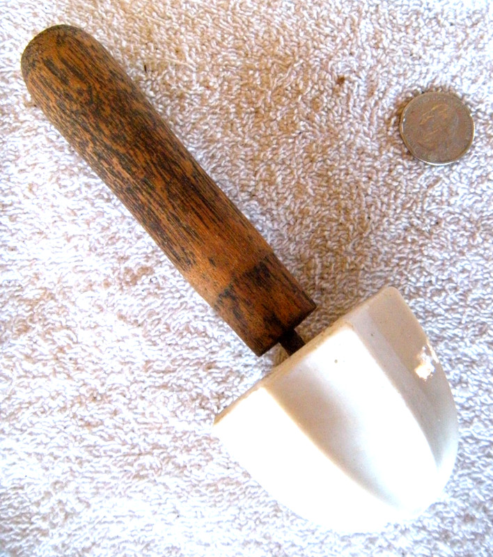 Handheld non-mechanical lemon reamer with ceramic reamer head -circa 1890's