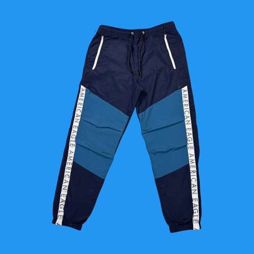 Joggers de colección American Eagle para hombre talla S ligeros bloques de colores forrados con malla - Imagen 1 de 17