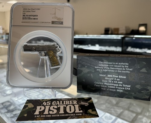 45 Caliber Pistol S10KF 2024 Chad 2 Oz Gilt Silver Coin Antiqued NGC MS 70 - Picture 9 of 15