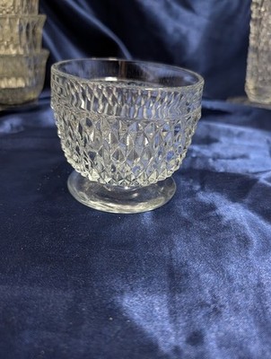 Beautiful vintage clear pressed glass serving bowl featuring an elegant scallope