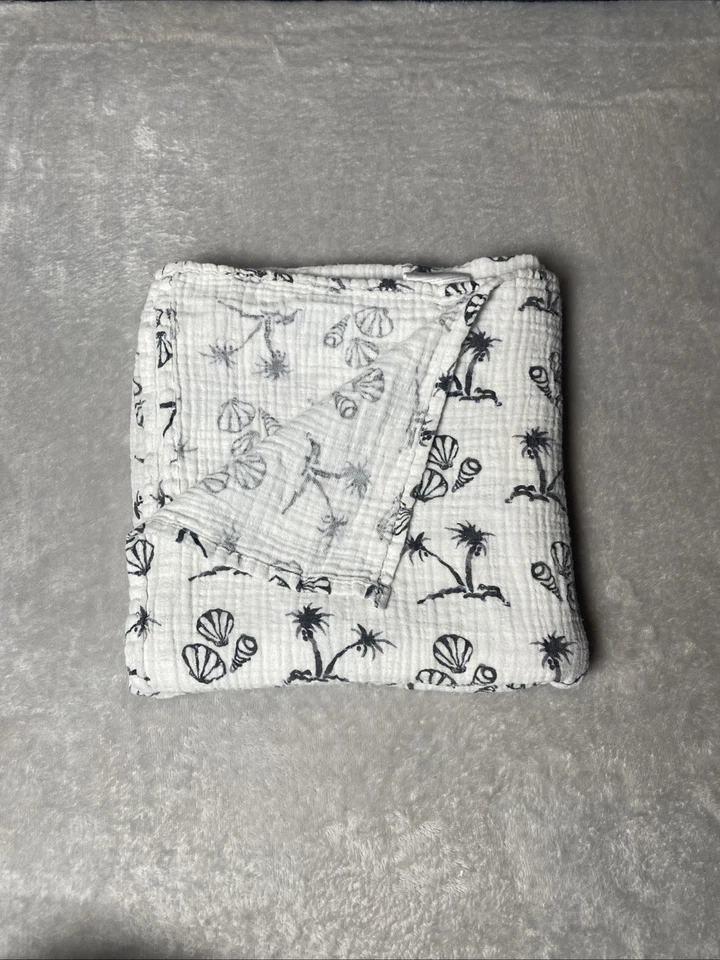 Manta de bebé etiqueta blanca Aden & Anais palmera concha de mar muselina envoltura Lovey Foto 2 de 4