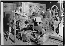 35. INTERIOR VIEW, SAME ABOVE FEEDER ROD INSERTED INTO MACHINE; NOTE WOOD