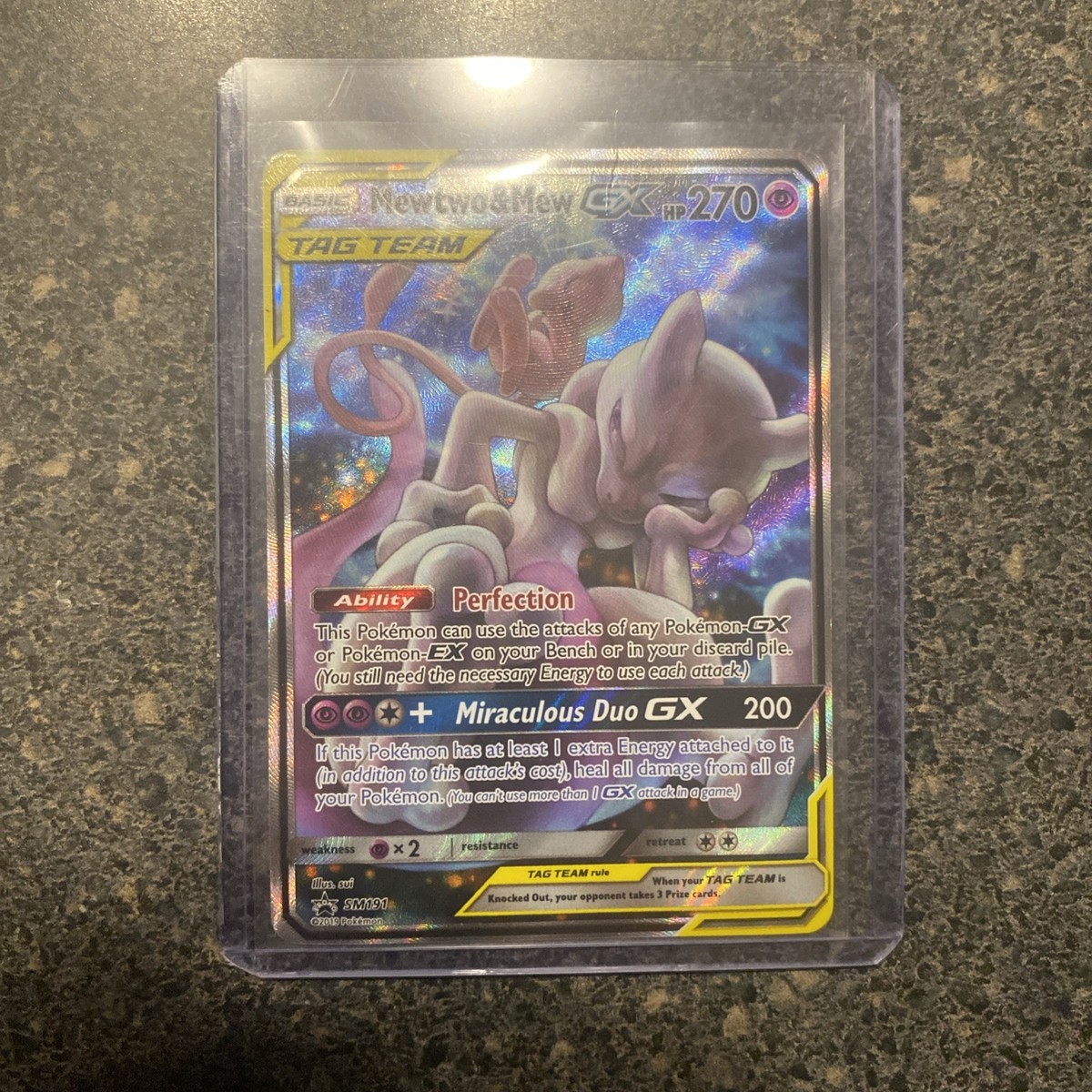 Mewtwo & Mew GX SM191 Holo Black Star Promo Illustration Tag Team