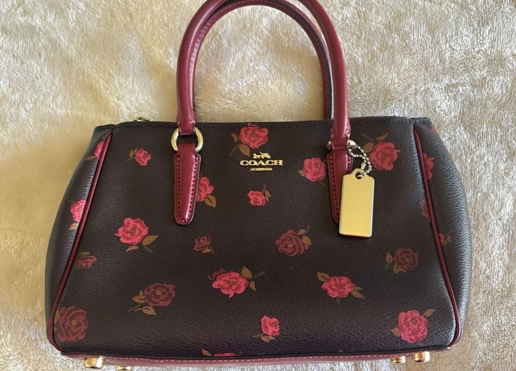 Autentica borsa Coach Mini Rowan nera floreale rosa bordeaux bordo borsetta
