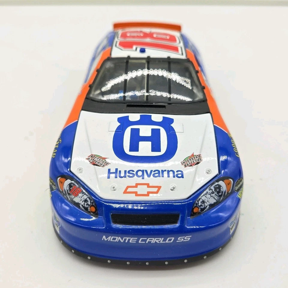 Motorsports Authentics #18 Husqvarna Chevy Monte Carlo SS – 1:24 NASCAR Diecast - Image 3 of 4