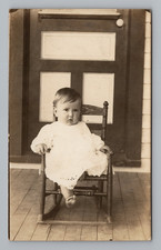 Postcard RPPC Little Child Rocking Chair Bare Foot Studio Portrait AZO 1900s