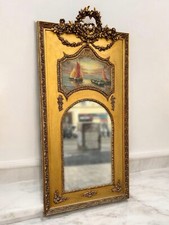 Une Tableau avec miroir style Louis XV et bois de hêtre doré sculpté