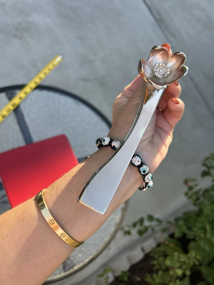 Clip enchapado en plata Christofle marca de lujo francesa con diseño de flores Foto 2 de 4