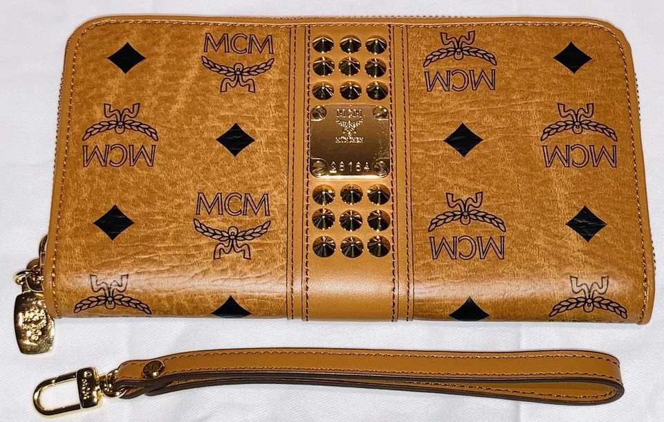 AUTÉNTICA PULSERA/CARTERA MCM VISETOS TACHONADA CREMALLERA GRANDE ALREDEDOR COÑAC ¡¡NUEVA SIN ETIQUETAS!!! Foto 3 de 4
