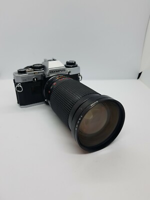 Olympus OM10 analoge Spiegelreflexkamera mit 28-200mm Objektiv - sehr guter Zustand