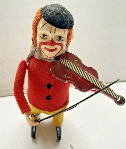 Clown giocattolo vintage anni 30 carica Schuco che suona violino rosso/giallo Germania funzionante - Foto 2 di 8