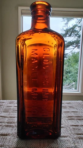 Antique Mange Cure Bottle