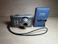 Appareil Photo Avec Chargeur SD Appareil Photo Compact Canon IXUS 115 HS (PowerShot ELPH 100 HS) - 12,1 MP, Zoom 4x - Occasion Avec Accessoires Honda Shadow 125
