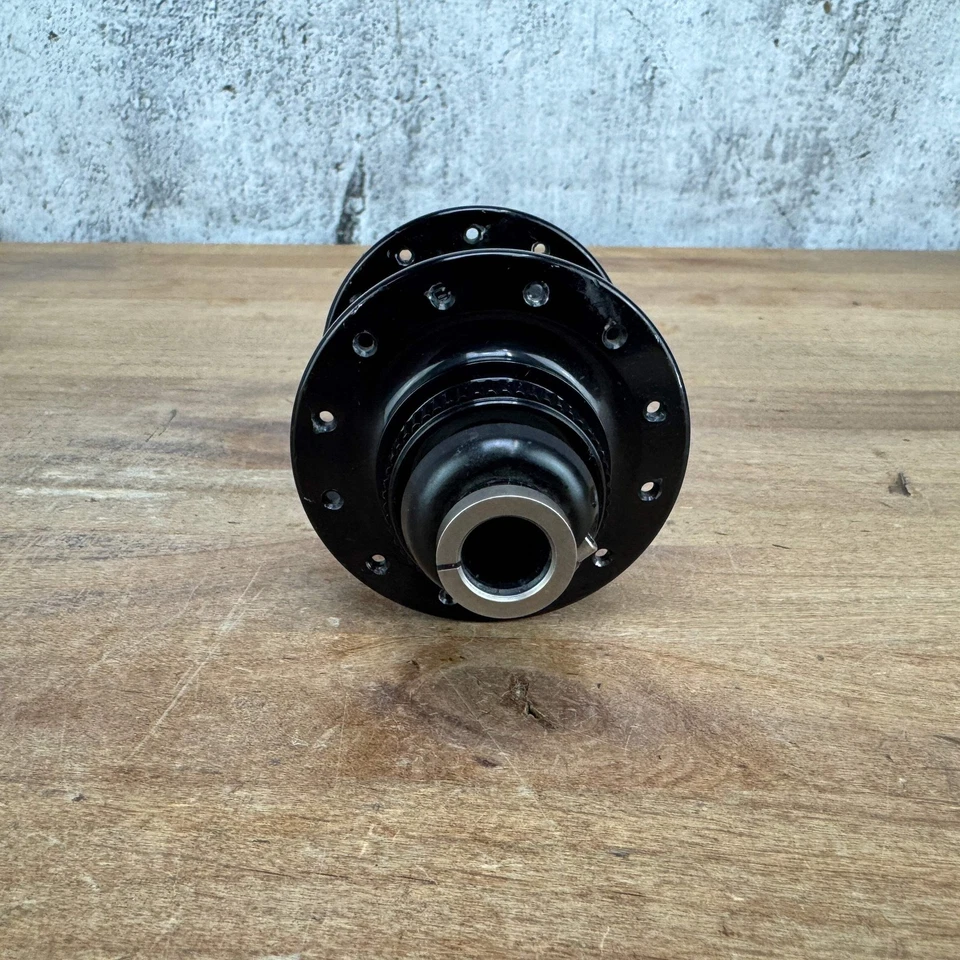 ¡Ligero uso! Buje de freno de disco trasero Chris King R45D negro brillante 12 mm x 148 mm 263 g Foto 4 de 4