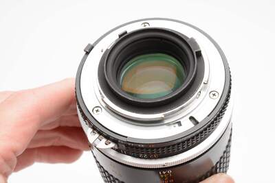 Nikon MF Micro-Nikkor 105mm f2.8 lens w/HS-14 lens hood and caps