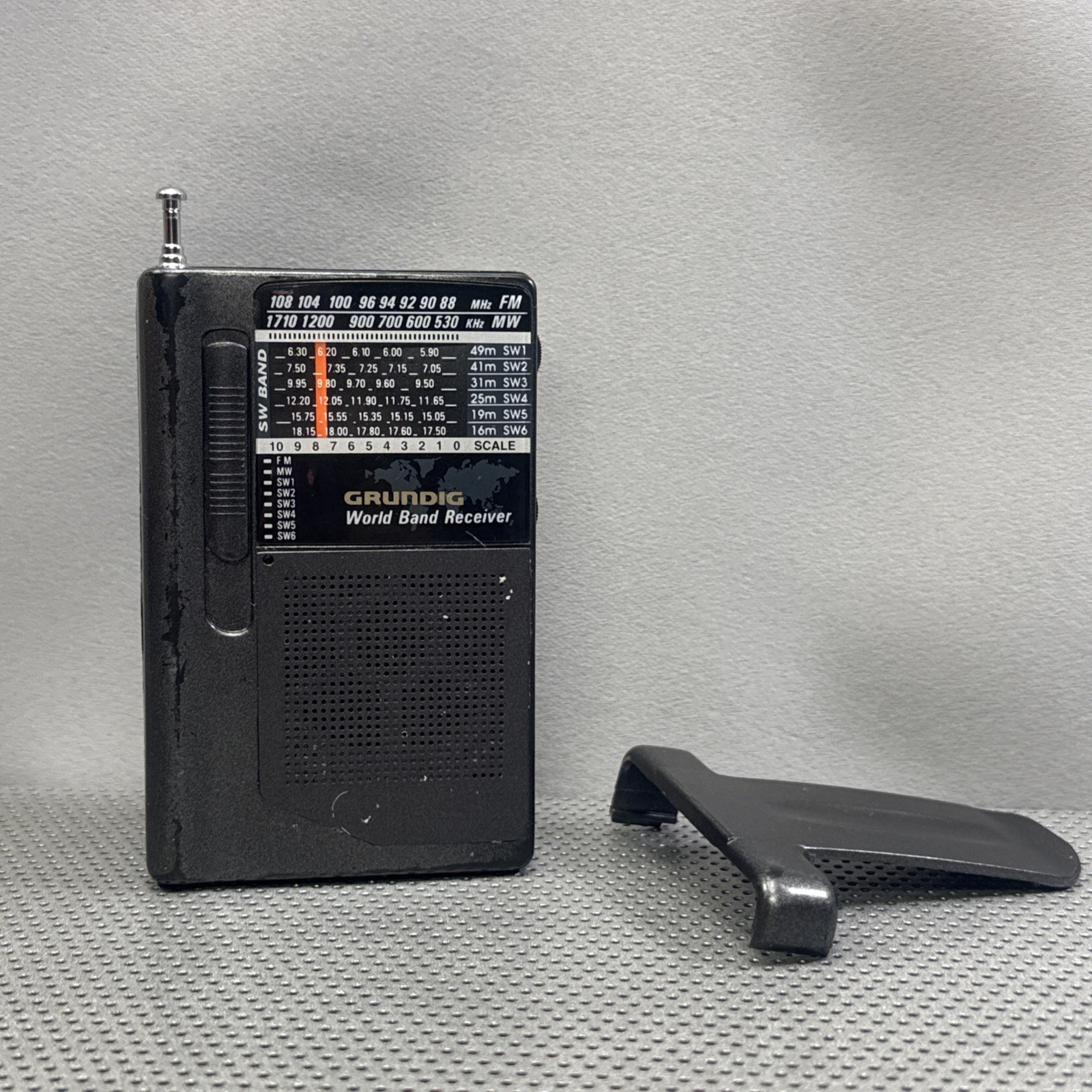 Grundig Mini World Band AM/FM Receiver Black - portable belt clip