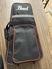 Used Pearl Bell Kit. Comes With Sticks, Mallets, Stand, Practice Pad Rolling Bag