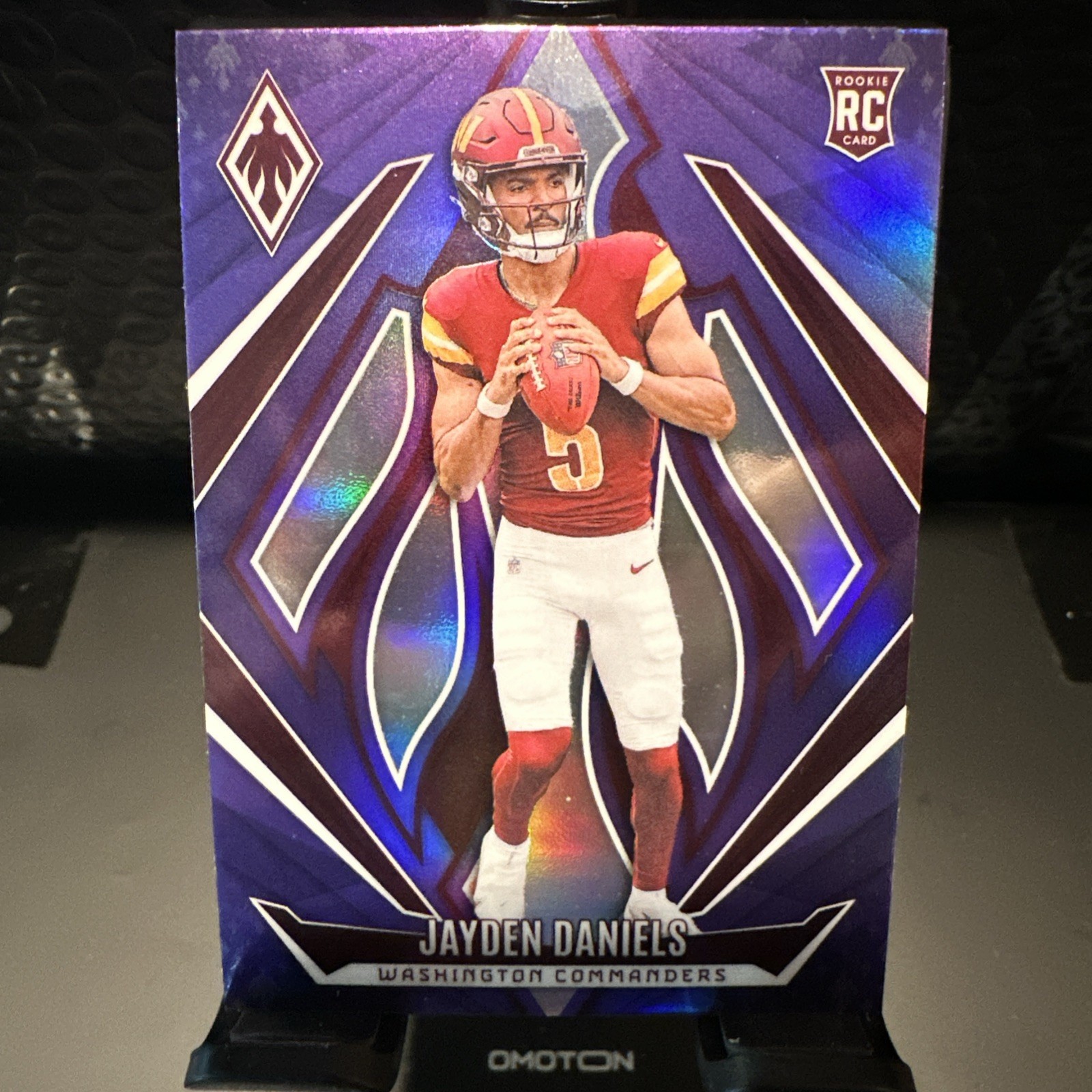 2024 Panini Phoenix - Rookies Jayden Daniels #198 Purple (RC)