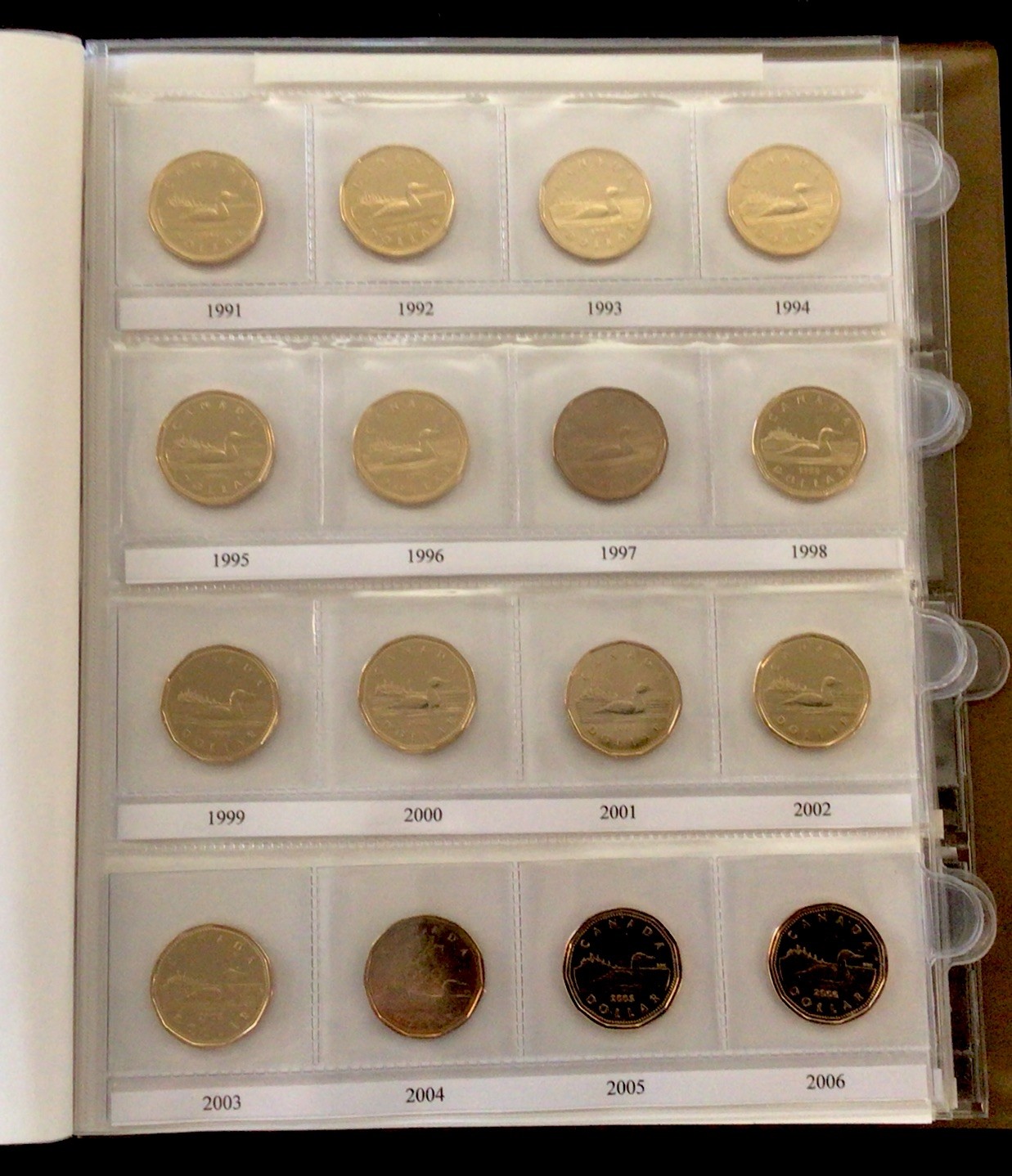 Canada Dollars 1935-1986 Uni-Safe Book! With 56 Coins 1965-2016! ENN Coins