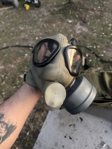 Military gas mask with bag