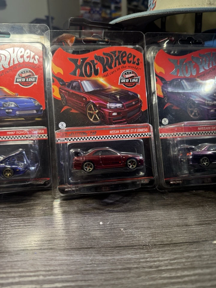 Hot Wheels RLC Lote Toyota Supra, GT-R R34 Rojo, GT-R R34 Púrpura y 1993 RX-7 Foto 2 de 4