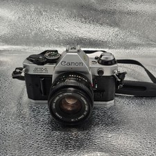 Canon AE-1 Program 35mm SLR Film Camera with Canon FD 50mm F1.8 Lens