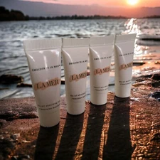 Lot of 4) La Mer Deluxe Sample Size The Oil Absorbing Lotion, 0.12 Fl Oz / 3 mL