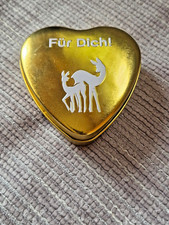 Begehrtes goldenes Herz als Blechdose -- Air Berlin-- zur Bambi Verleihung