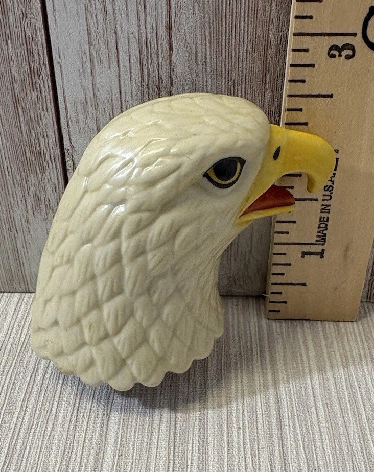 A bald eagle head ceramic bottle stopper that turns any decanter into a patriotic conversation piece — vintage barware at its most theatrical.