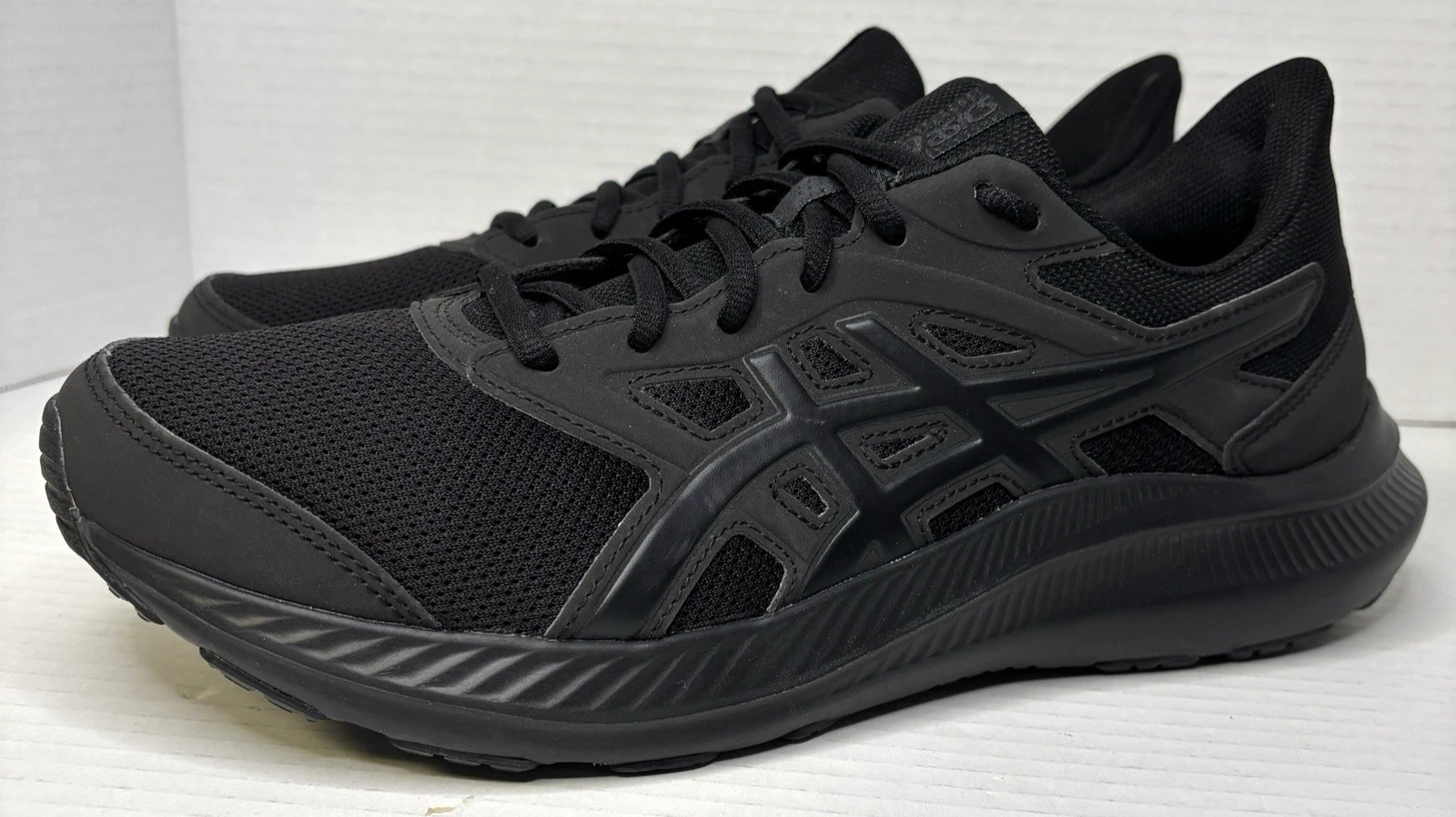 Sneakers da corsa ASICS Jolt 4 basse triple nere 1011B603 001 da uomo taglia 9 5