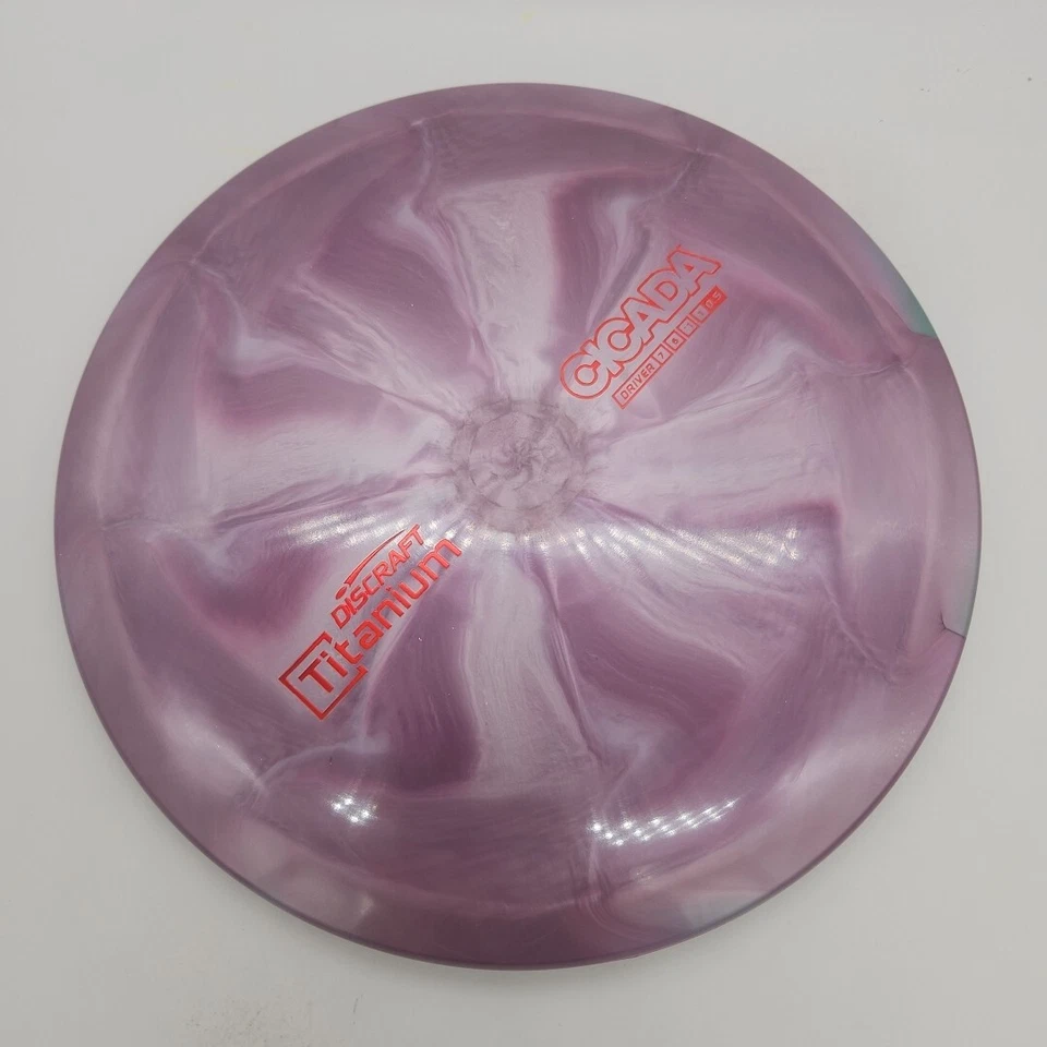 Discraft титана цикада фиолетовый/красный штамп 167-169g 7/6/-1/1 - Изображение 2 из 3