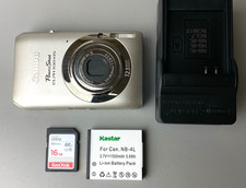 Canon PowerShot ELPH 100 HS 12.1MP Digital Ca...