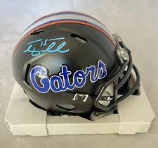 UNIVERSITY OF FLORIDA GATORS TIM TEBOW signed RIDDELL BLACK MINI HELMET BECKETT