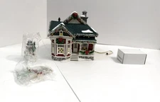Dept 56 Snow Village Christmas Lane The Tinsel and Garland House 55609
