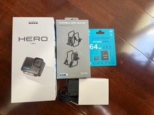 NEW & Unopened GoPro Hero 4K Action Camera Bundle–Includes SD Card + Grip Mount