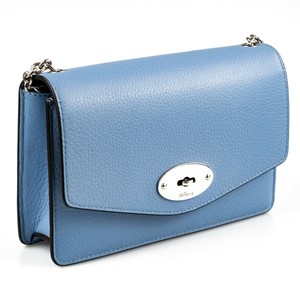 small blue clutch bag