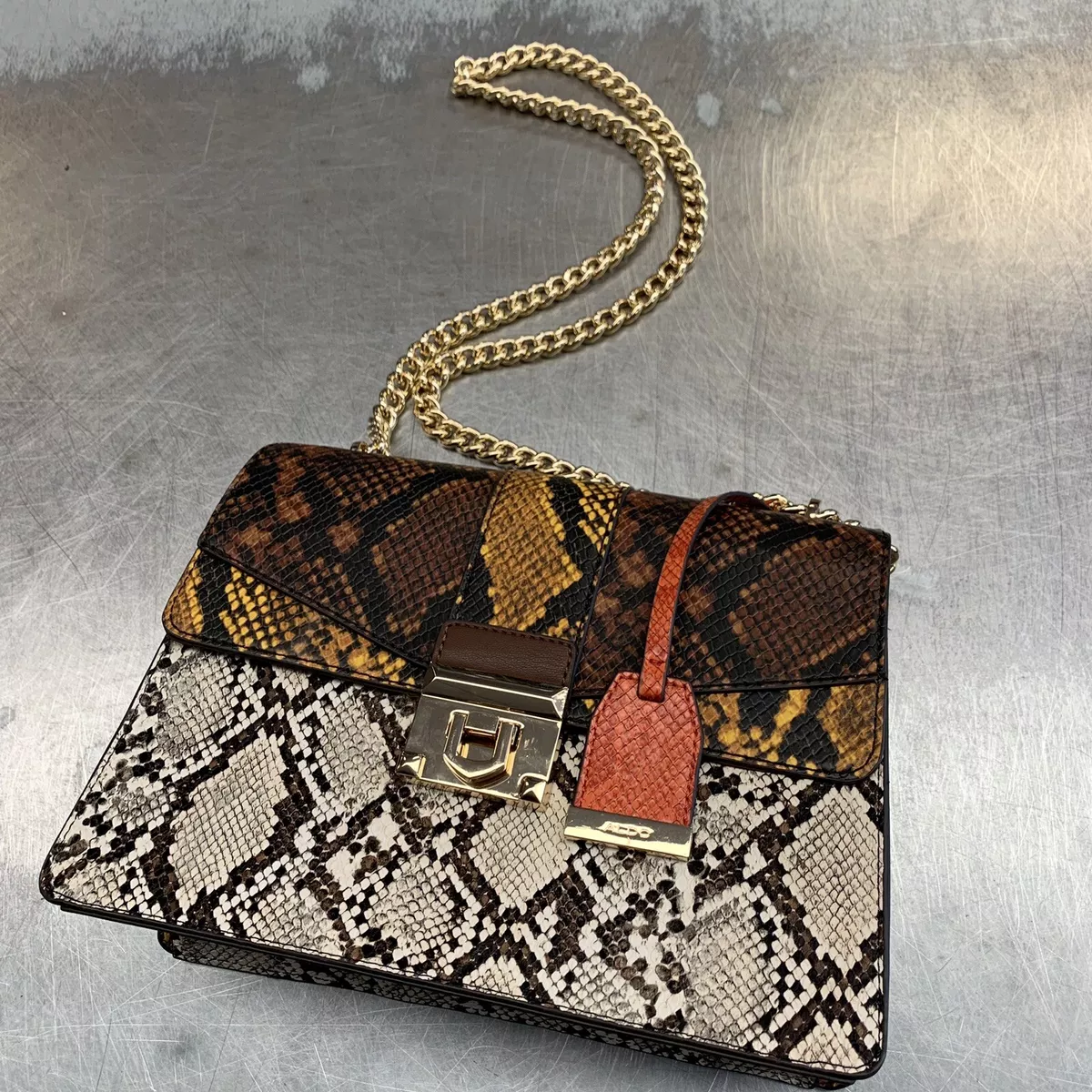 Aldo snake outlet print bag