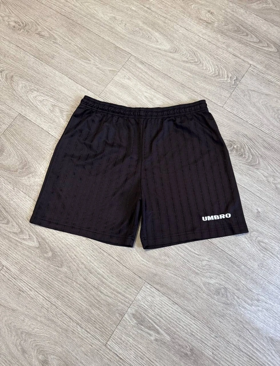 Short de foot vintage Umbro orange monogramme homme taille 38 Short de foot vintage Umbro orange monogramme homme taille 38