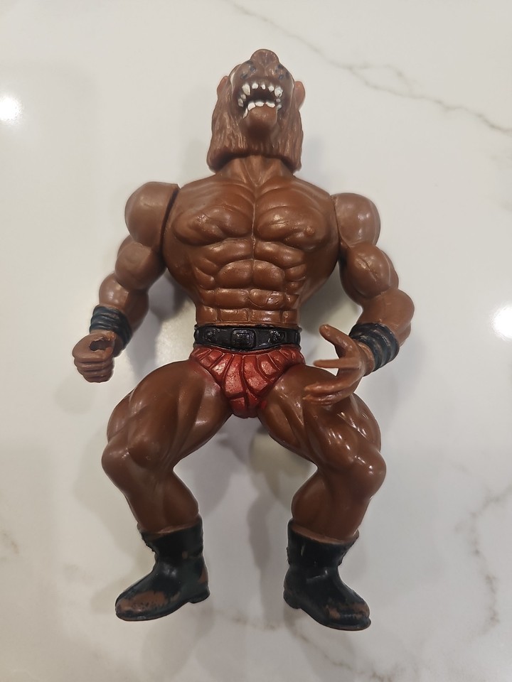 A knock-off MOTU bootleg Wolfman muscle figure from the Galaxy Heroes line — the kind of gloriously weird dollar-store artifact that collectors go absolutely feral for.