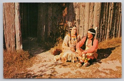 1957 Chief White Wolf Happy Day Woman Chippewa Indian Tribe Log Hut Postcard