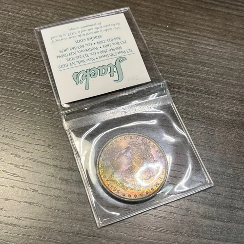 SEALED 1884 UNC Morgan Silver Dollar, in 2007 Stack's Auction Flip- Pretty Toned